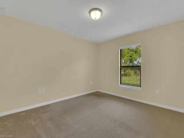 121 Shadow Lakes DR, LEHIGH ACRES FL 33974