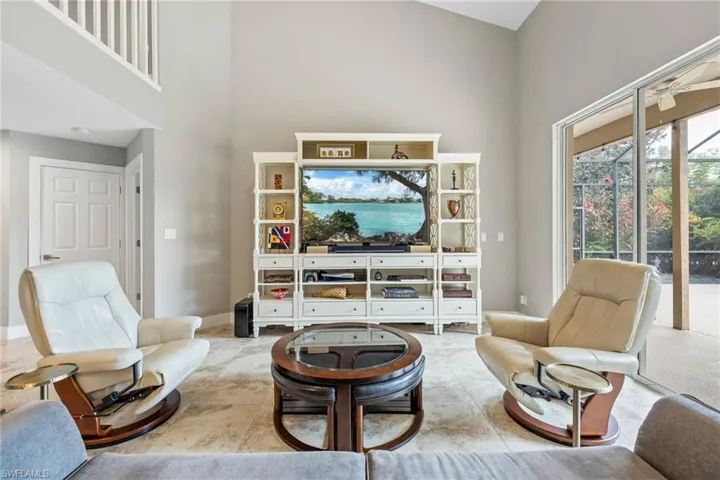 Living area with a towering ceiling