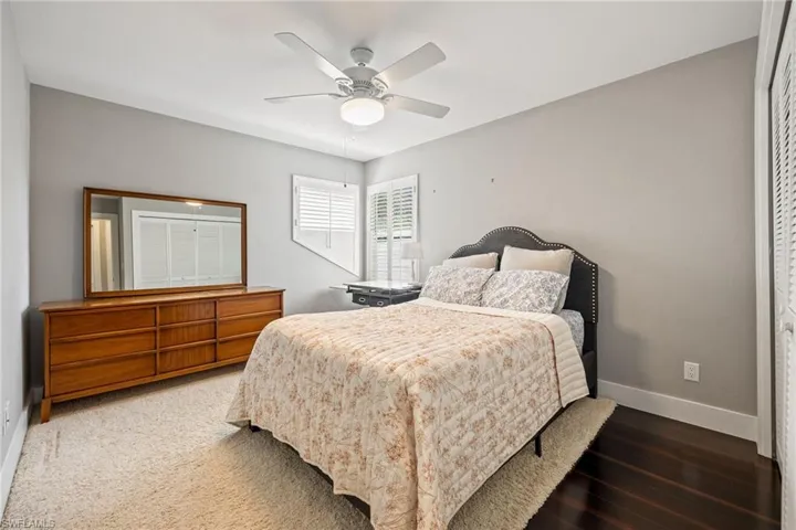 Bedroom featuring baseboards and a ceiling fan