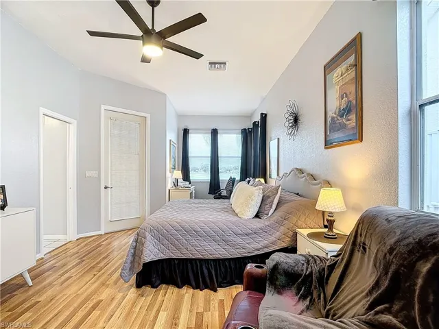 Primary Bedroom featuring ceiling fan and light wood-type flooring