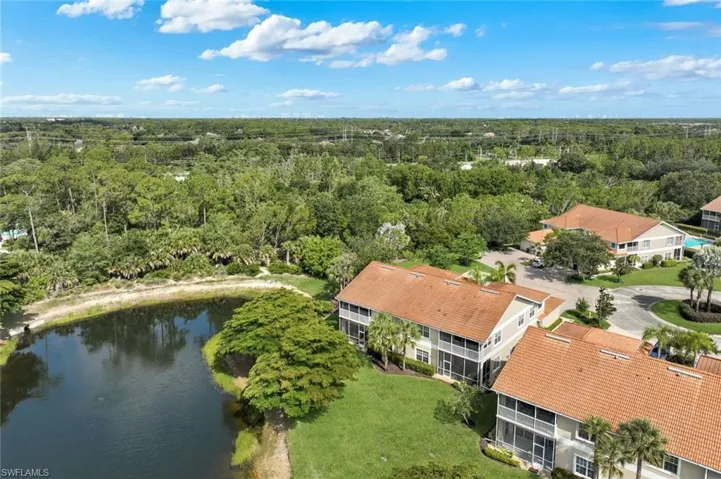 Located on a private cut-de-sac lot backing to a lake
