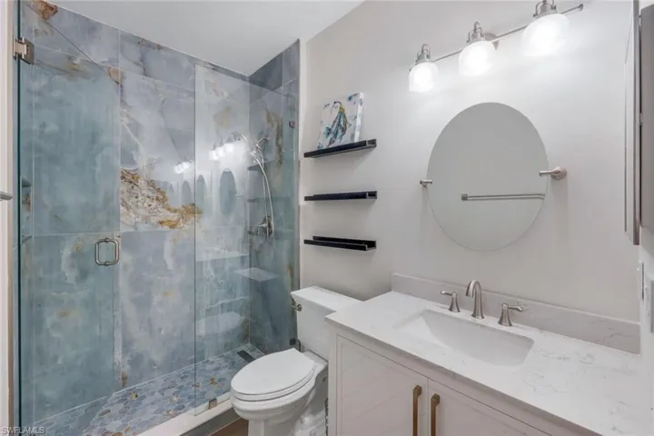 Updated stylish guest bathroom.