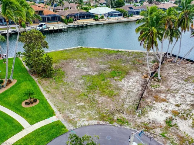 Bird's eye view with a water view and a residential view