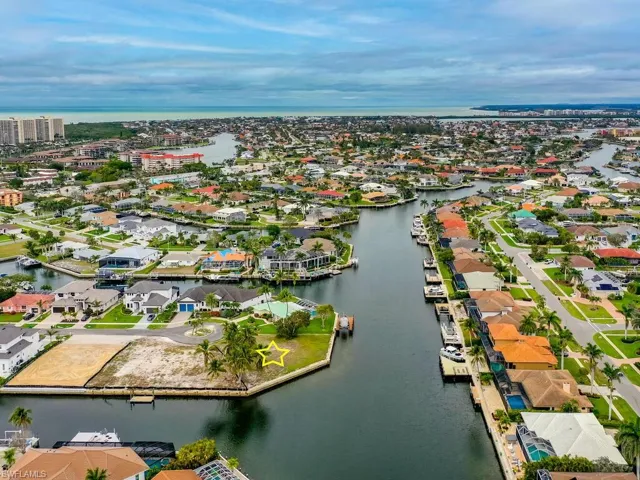 Bird's eye view with a water view and a residential view