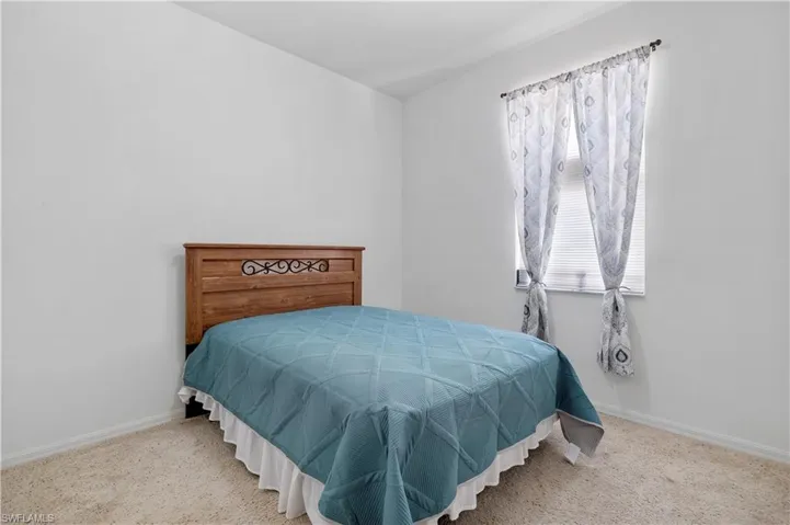 Bedroom featuring carpet