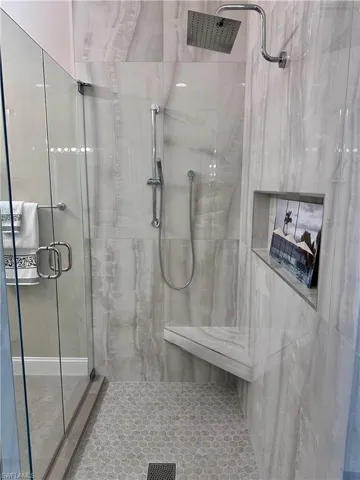 15402 Trevally Way Bonita Springs FL 34135 - shower with seat and handheld options