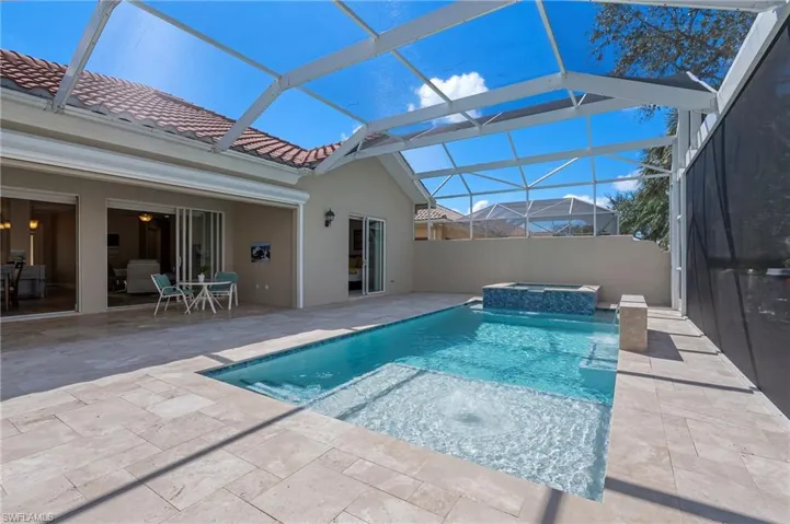 15402 Trevally Way Bonita Springs FL 34135 - Picture frame cage and travertine pool deck