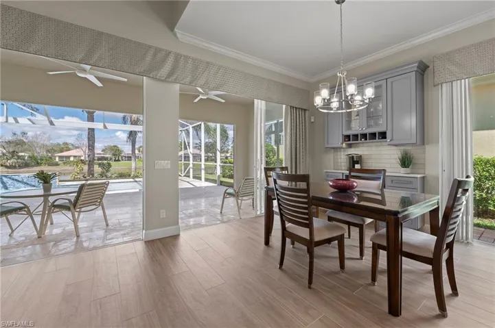15402 Trevally Way Bonita Springs FL 34135 - Dining area with coffee bar