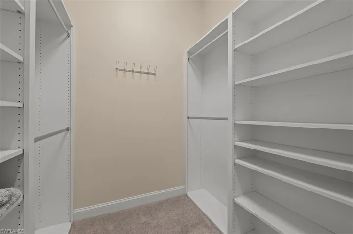 15402 Trevally Way Bonita Springs FL 34135 - Owner's closet with "California style" inserts