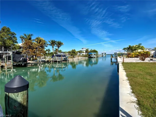 Water view with a boat dock