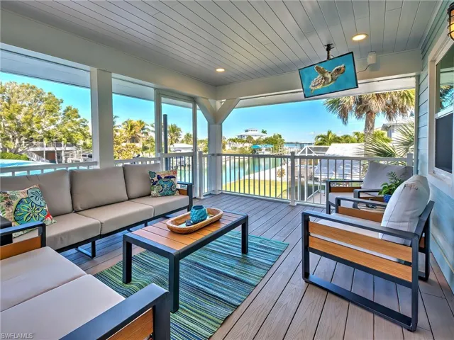 Wooden deck featuring outdoor lounge area