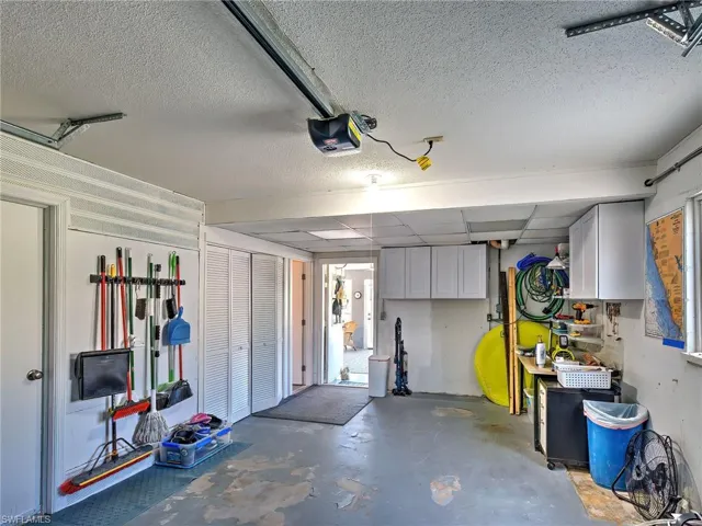 Garage featuring a garage door opener