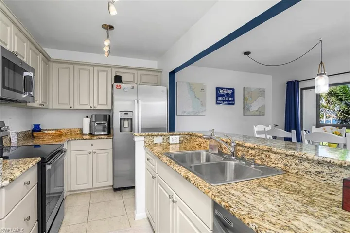Kitchen opens to the living space.