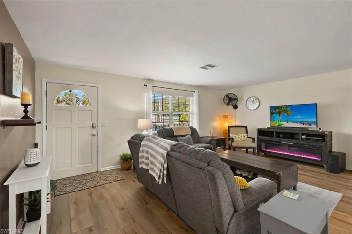 Living room featuring hardwood / wood-style flooring