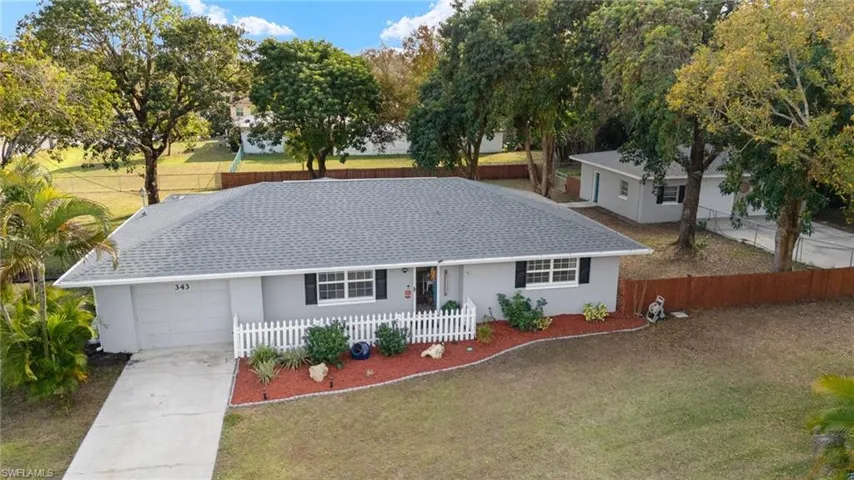 Single story home with a garage