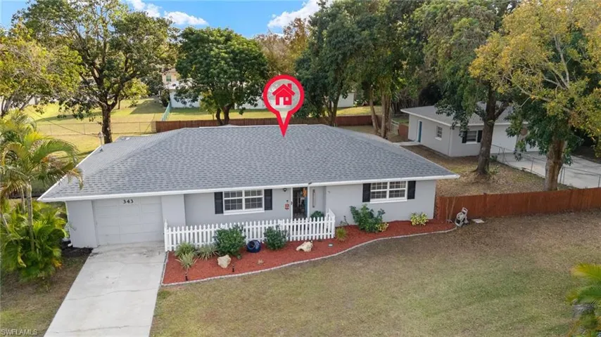 Ranch-style home with a garage