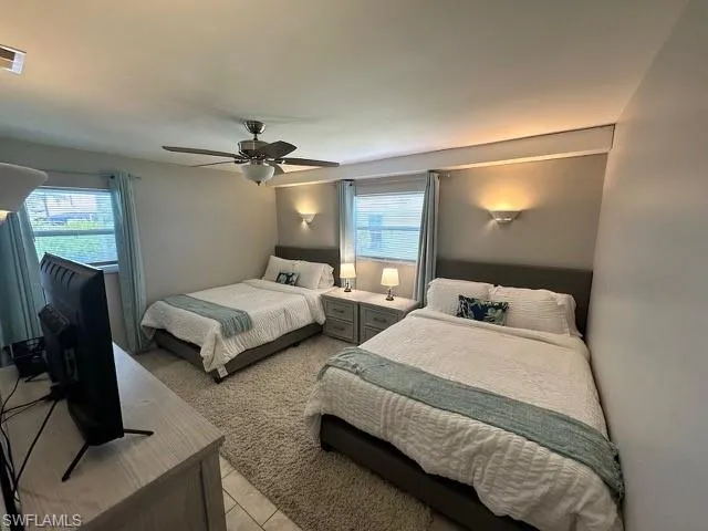 Bedroom featuring a ceiling fan