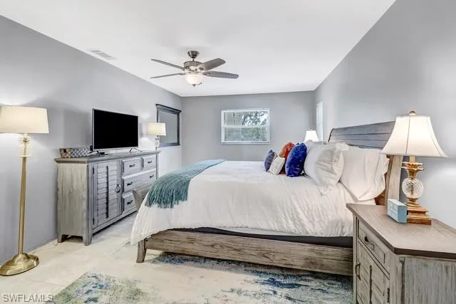 Bedroom featuring a ceiling fan