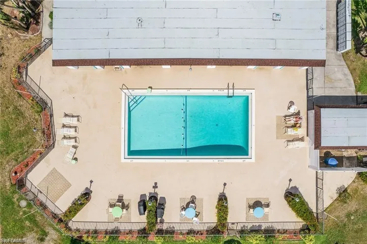 Drone / aerial view of a pool area