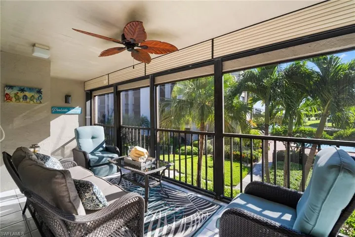 Sunroom with ceiling fan and a healthy amount of sunlight