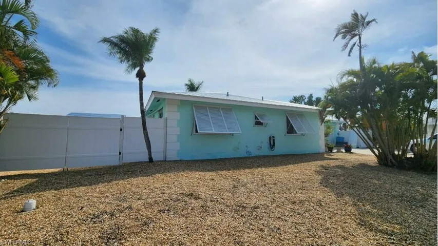 EXTERIOR.  FENCED.  ZEROSCAPE LANDSCAPING.