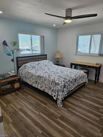 OWNER'S SUITE.  PLANK VINYL FLOORING.  IMPACT SLIDING WINDOWS,