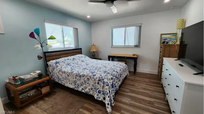 BIG OWNER'S SUITE.  RECESSED LIGHTING.  SLIDING IMPACT RESISTANT WINDOWS.  RECESSED LIGHTING.  MODERN CEILING FAN W/LIGHT.  ENTRANCE TO EN-SUITE BATH IS TO LEFT.