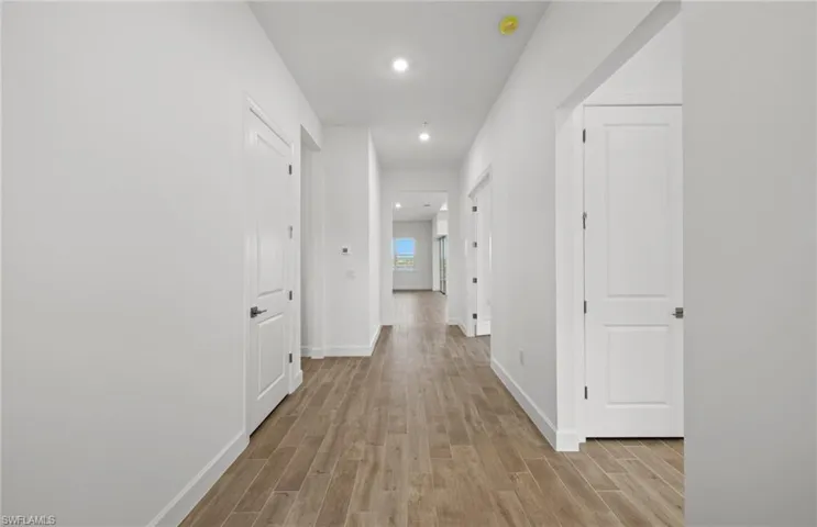 Hall featuring light hardwood / wood-style floors