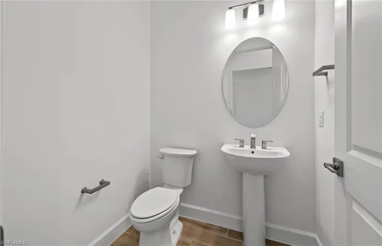 Bathroom with sink and toilet