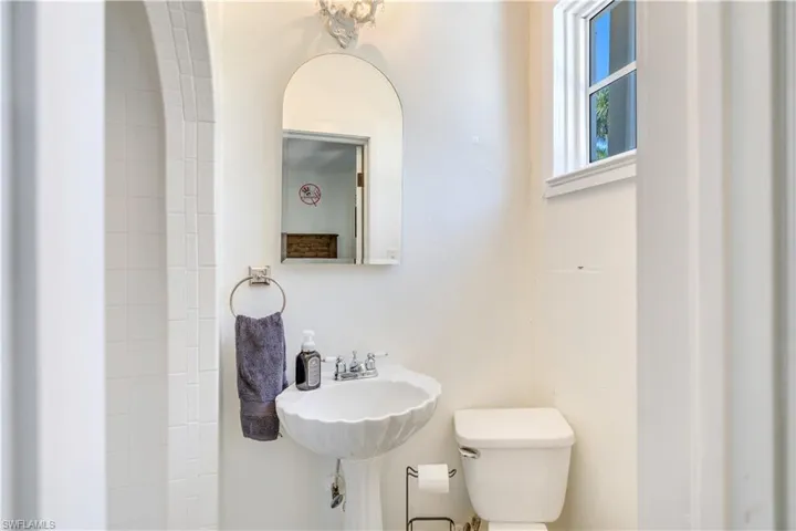 Bathroom featuring sink and toilet