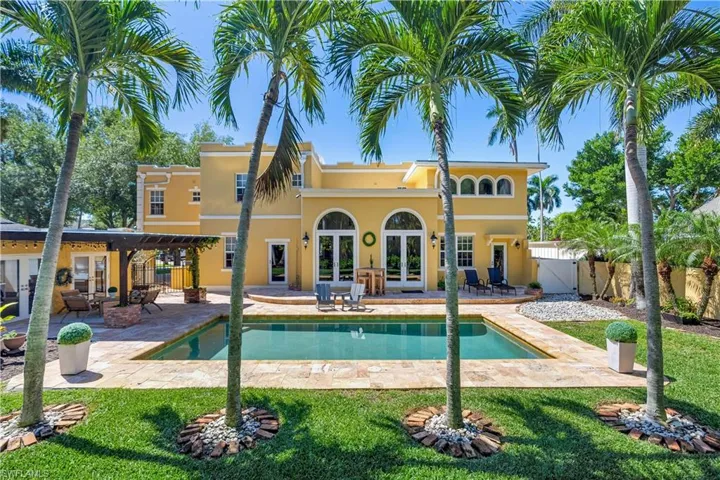 View of swimming pool with a patio area and french doors
