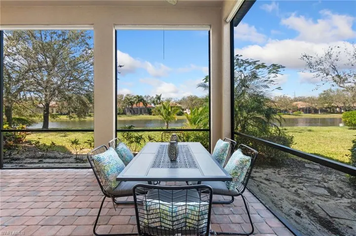 Sunroom with a water view