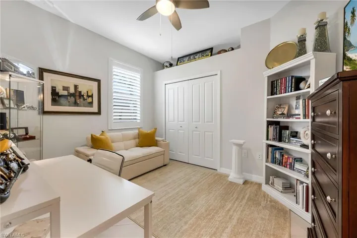 Bedroom #3 /Home office featuring a ceiling fan and closet
