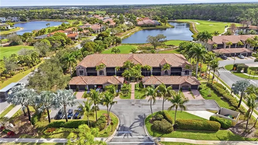 Aerial view of a nearby body of water and a local golf course