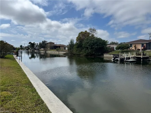 Water view featuring a dock