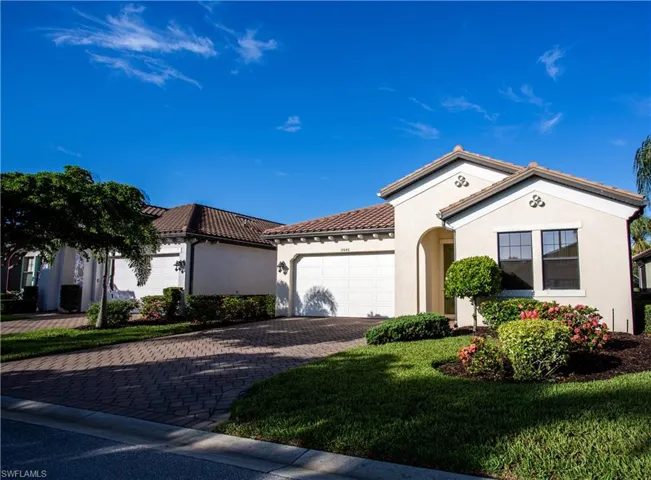 Tile roof, concrete block, stucco siding. Built in 2016. Hurricane rated garage door.