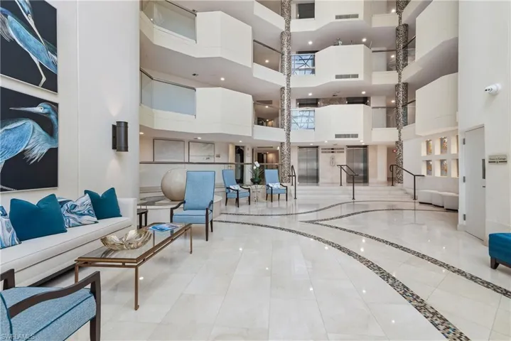 An appealing entryway complete with water feature and many standout architectural details