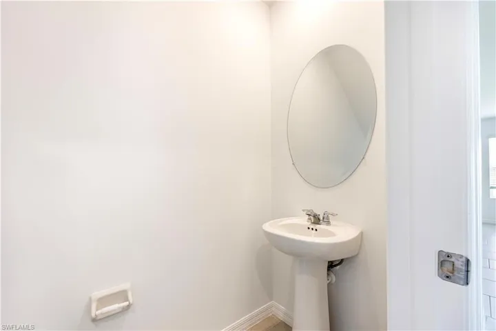 Bathroom featuring baseboards