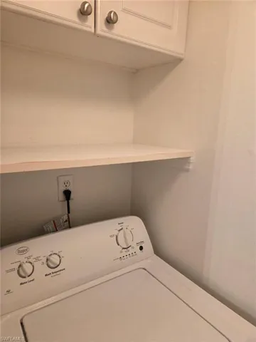 Washroom with washer / clothes dryer