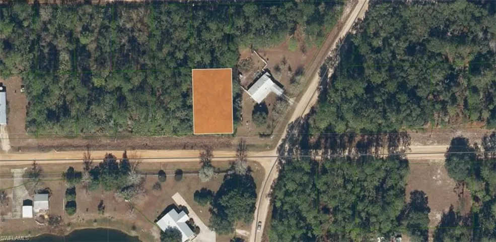 Aerial View. Depicting the property from an overhead perspective, highlighting its boundaries and surrounding geographic features