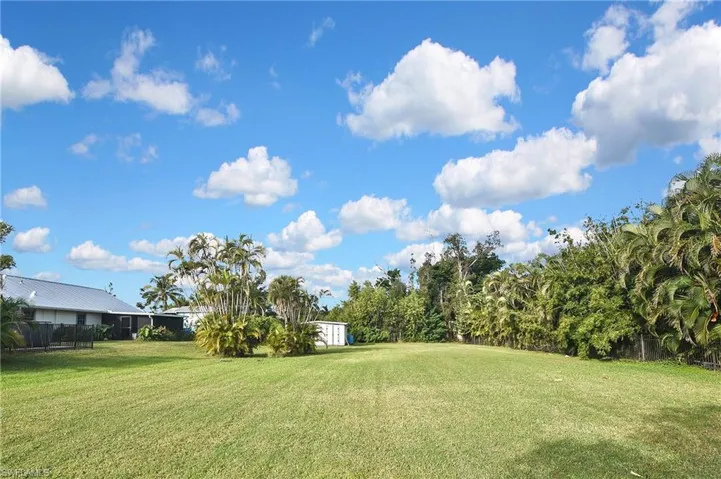 View of yard featuring view of wooded area