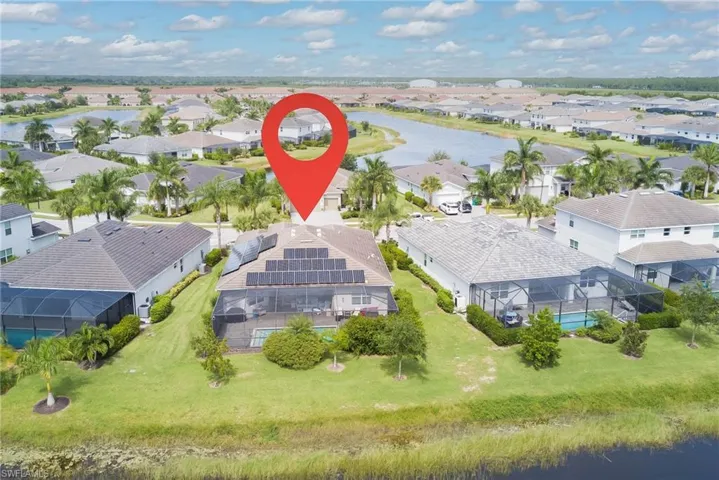 Aerial view of residential area with a nearby body of water