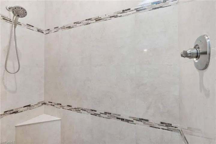 Bathroom with a tile shower