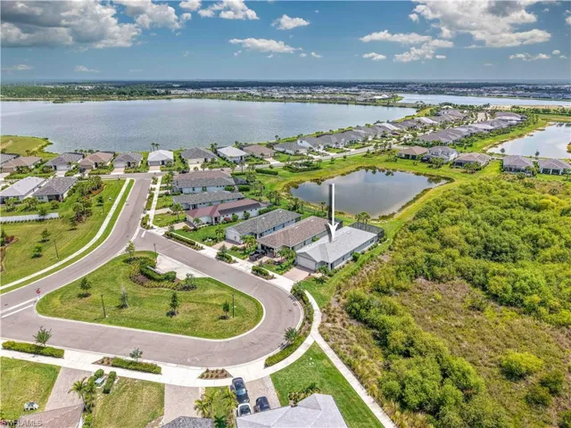 Aerial view of residential area with a nearby body of water
