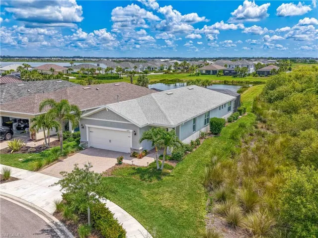 Aerial view of residential area with a large body of water