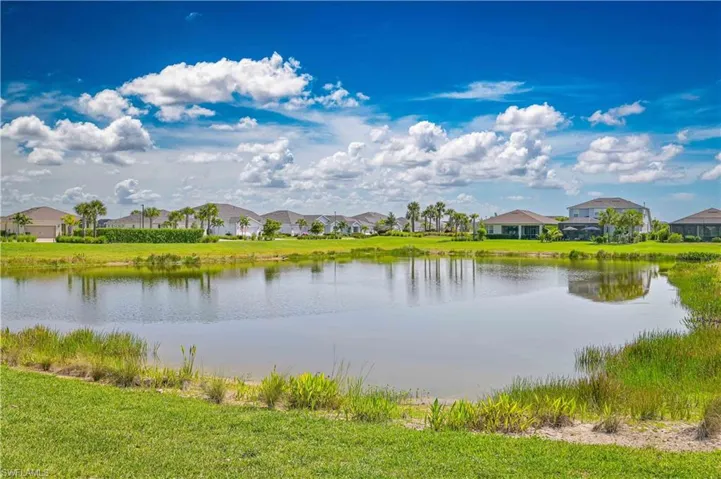 Water view featuring nearby suburban area