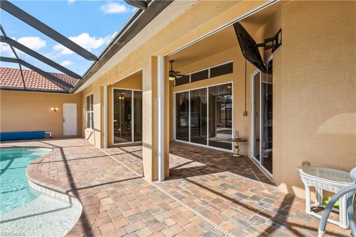 View of patio with ceiling fan