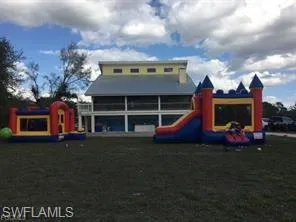 FRONT play area with a lawn FOR PARTY VENUE