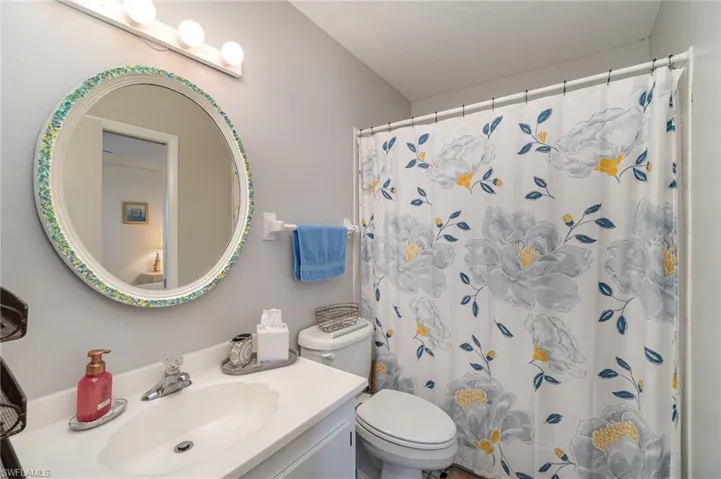 Bathroom with vanity and toilet