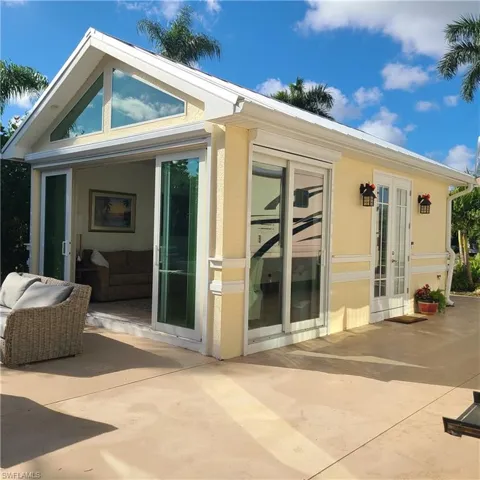 Rear view of house featuring a patio area